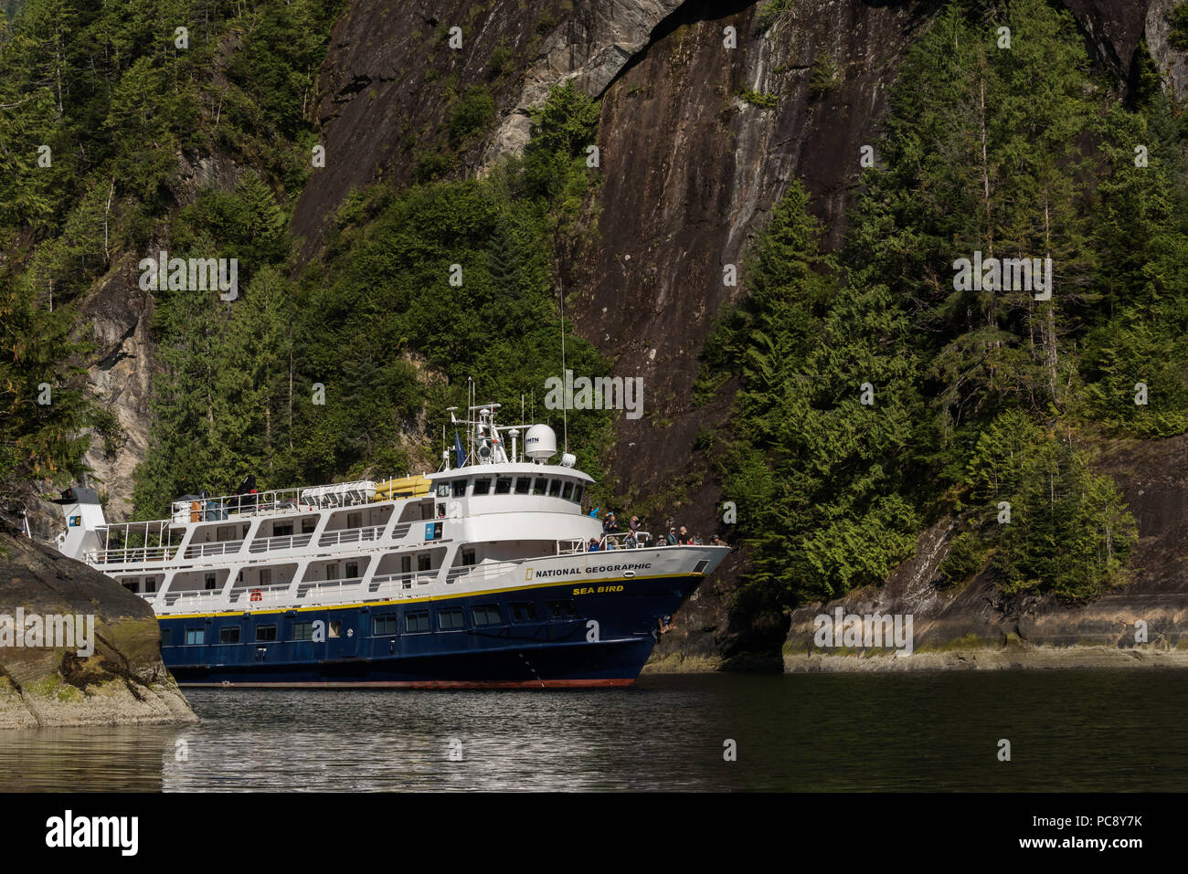 Lindblad''s MS National Geographic Sea Bird moving through a narrow passage in Alaska's Inside Passage. Stock Photo