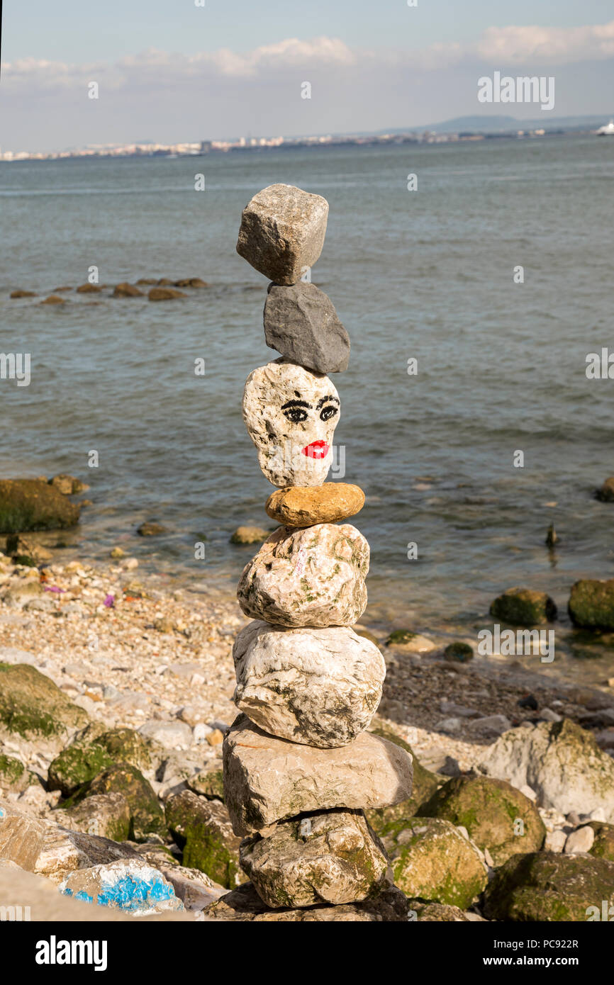 Lisbon Rocks Stacked rocks on the beach in Lisbon, Portugal. These rocks also are ...