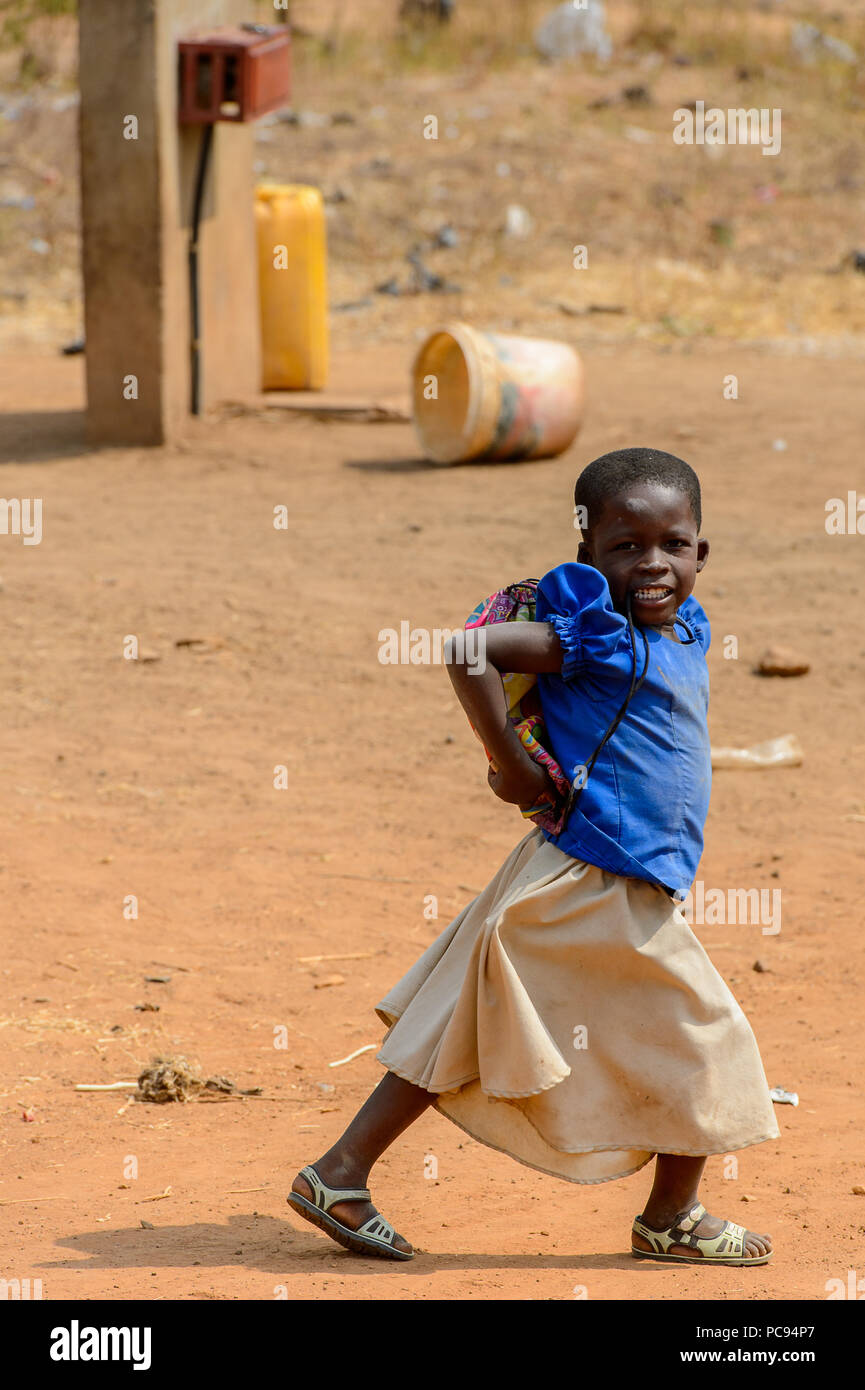 PIRA, BENIN JAN 12, 2017 Unidentified Beninese little girl in a blue