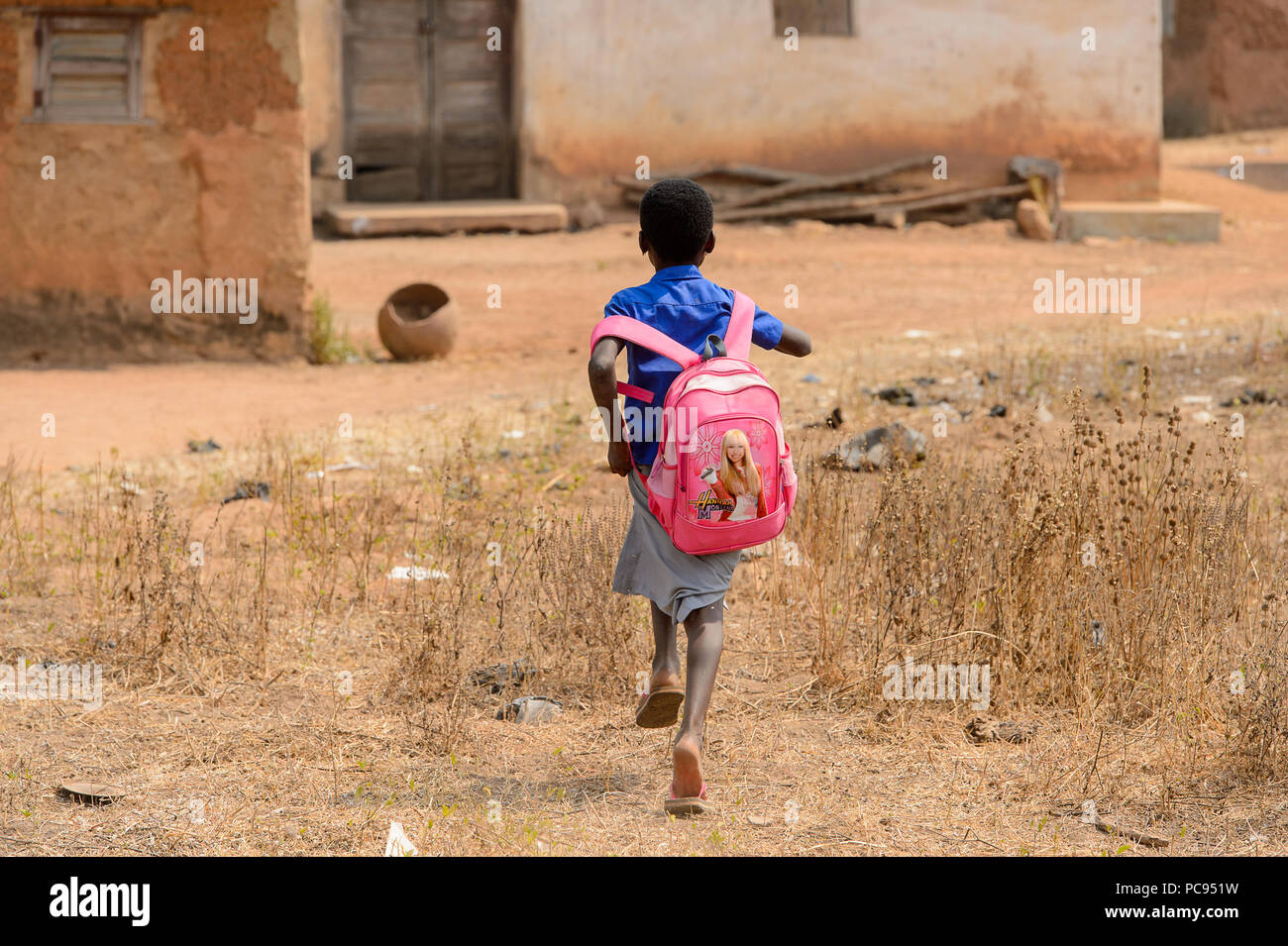 kid running with backpack