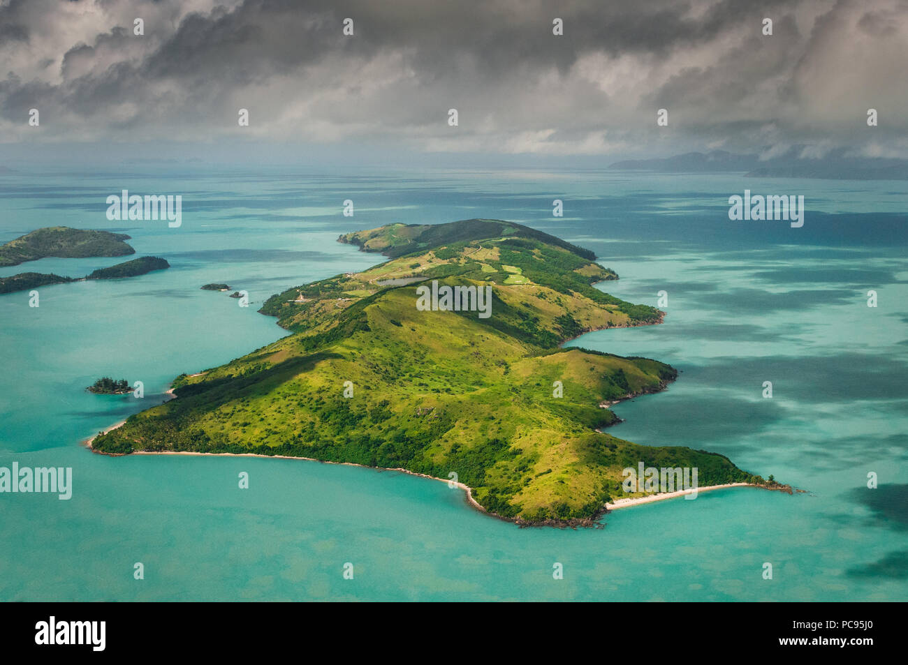 Aerial of Dent Island in the Whitsunday Islands. Stock Photo
