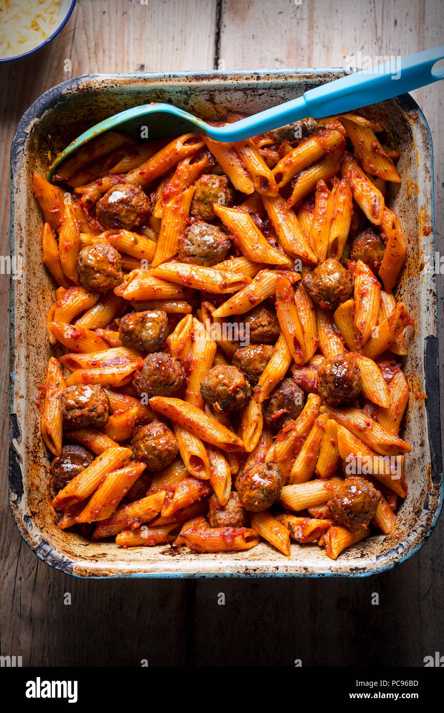 Meatballs & pasta bake with tomato sauce Stock Photo Alamy