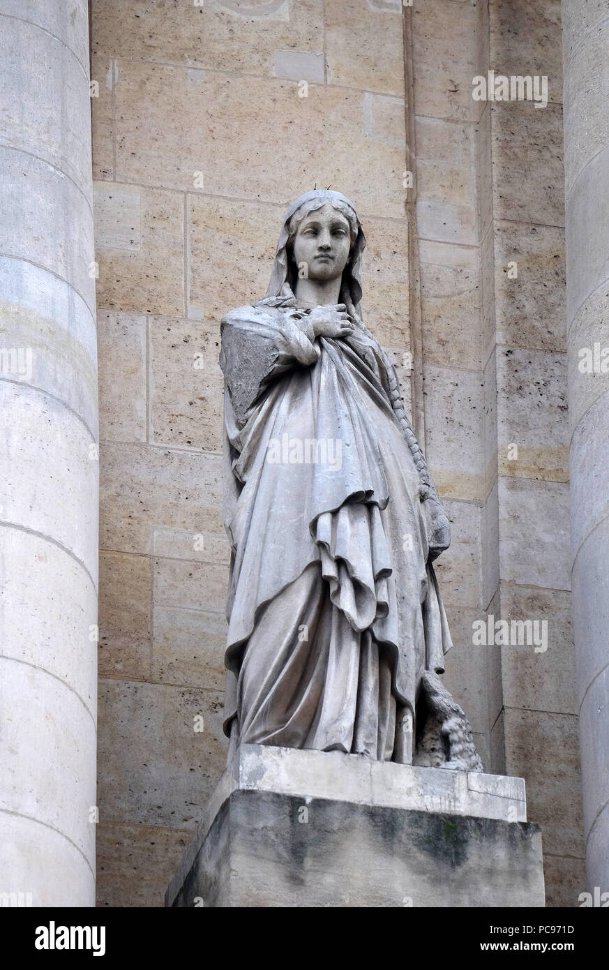 Saint Genevieve, statue on the portal of Saint Roch church in Paris
