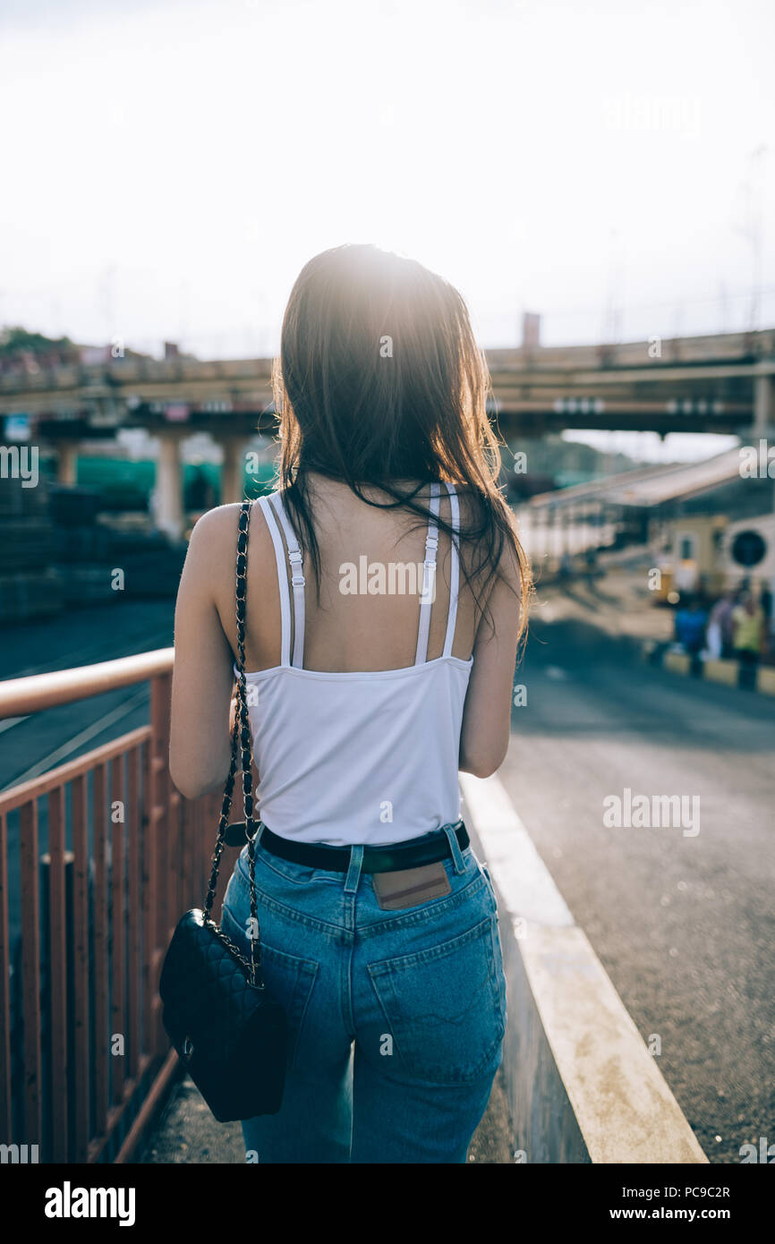 Girl walking down road hi-res stock photography and images - Page 2 - Alamy