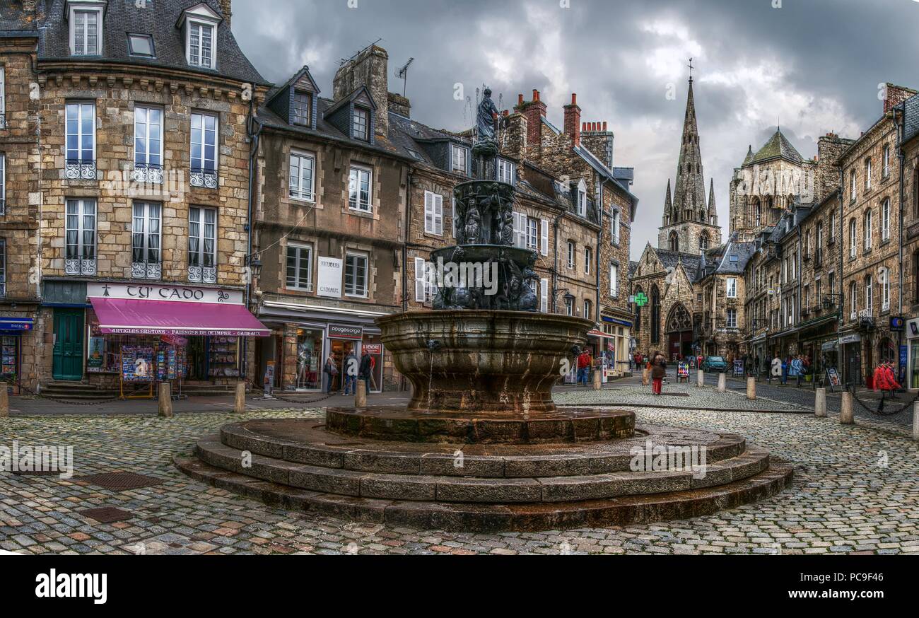 Town square showing fountain and cathedral, Guingamp Stock Photo