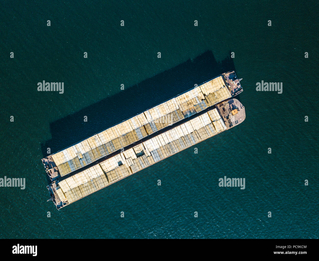 aerial view shipping cargo with containers isolated on the sea water ...