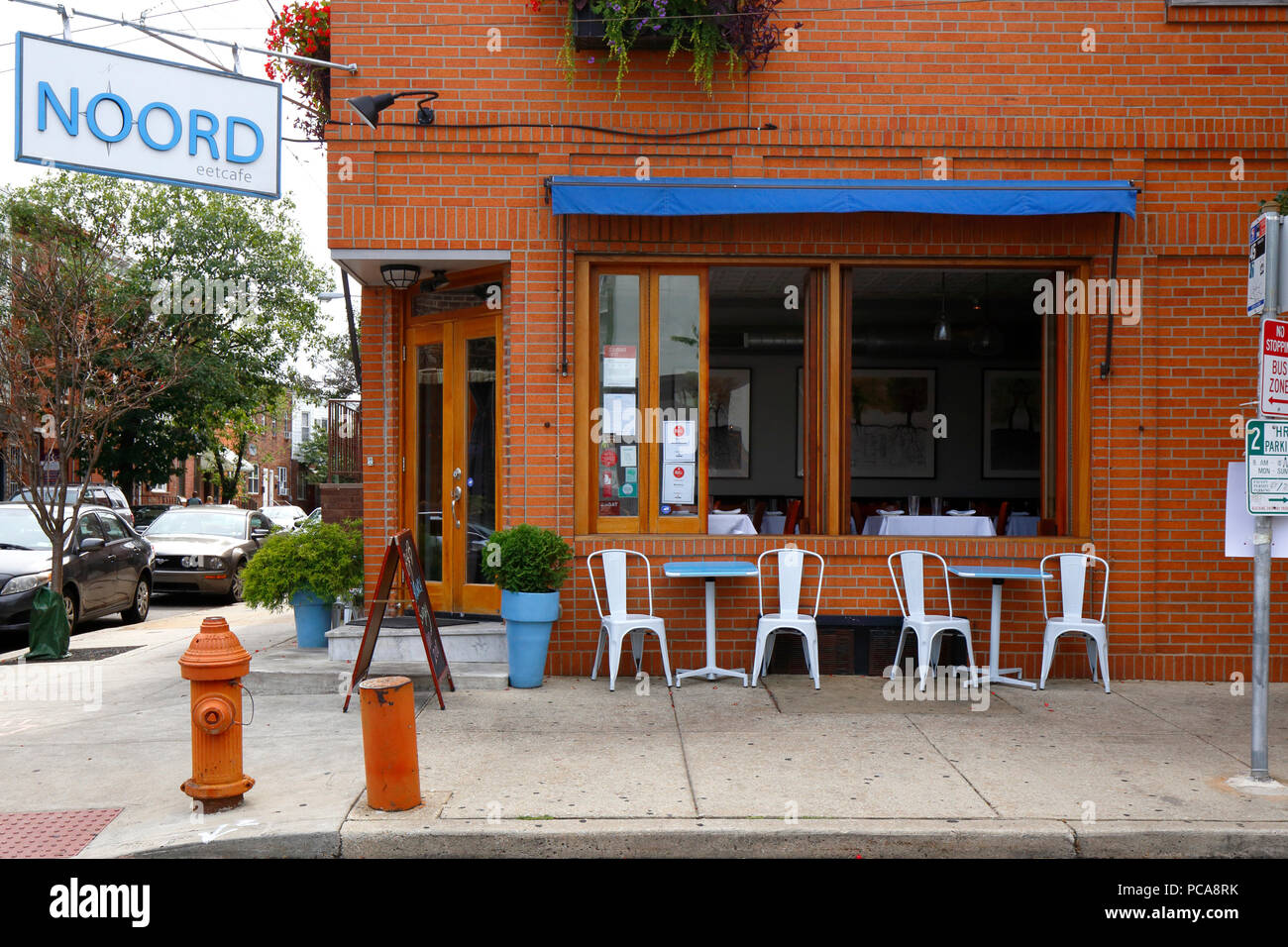 Noord, 1046 Tasker St, Philadelphia, PA. exterior storefront of a dutch restaurant, and sidewalk cafe in passyunk square. Stock Photo