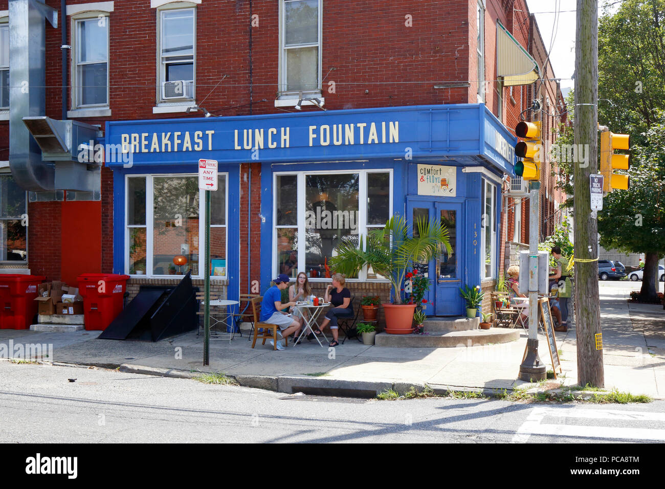 Comfort and Floyd, 1301 S 11th St, Philadelphia, PA. exterior storefront of a restaurant, and sidewalk cafe in passyunk square. Stock Photo