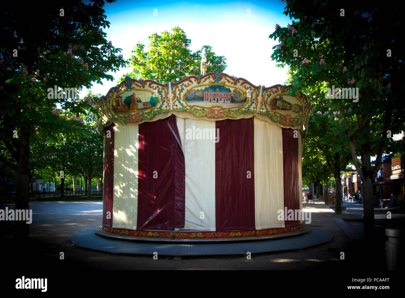 Closeup of a covered carousel in a park , France Stock Photo - Alamy