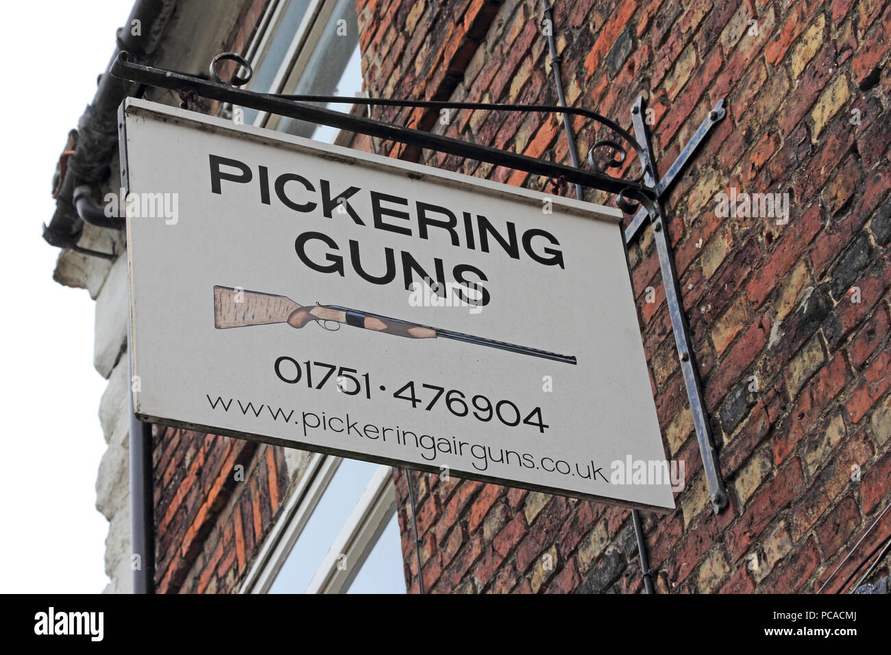 Pickering Gun shop sign Stock Photo