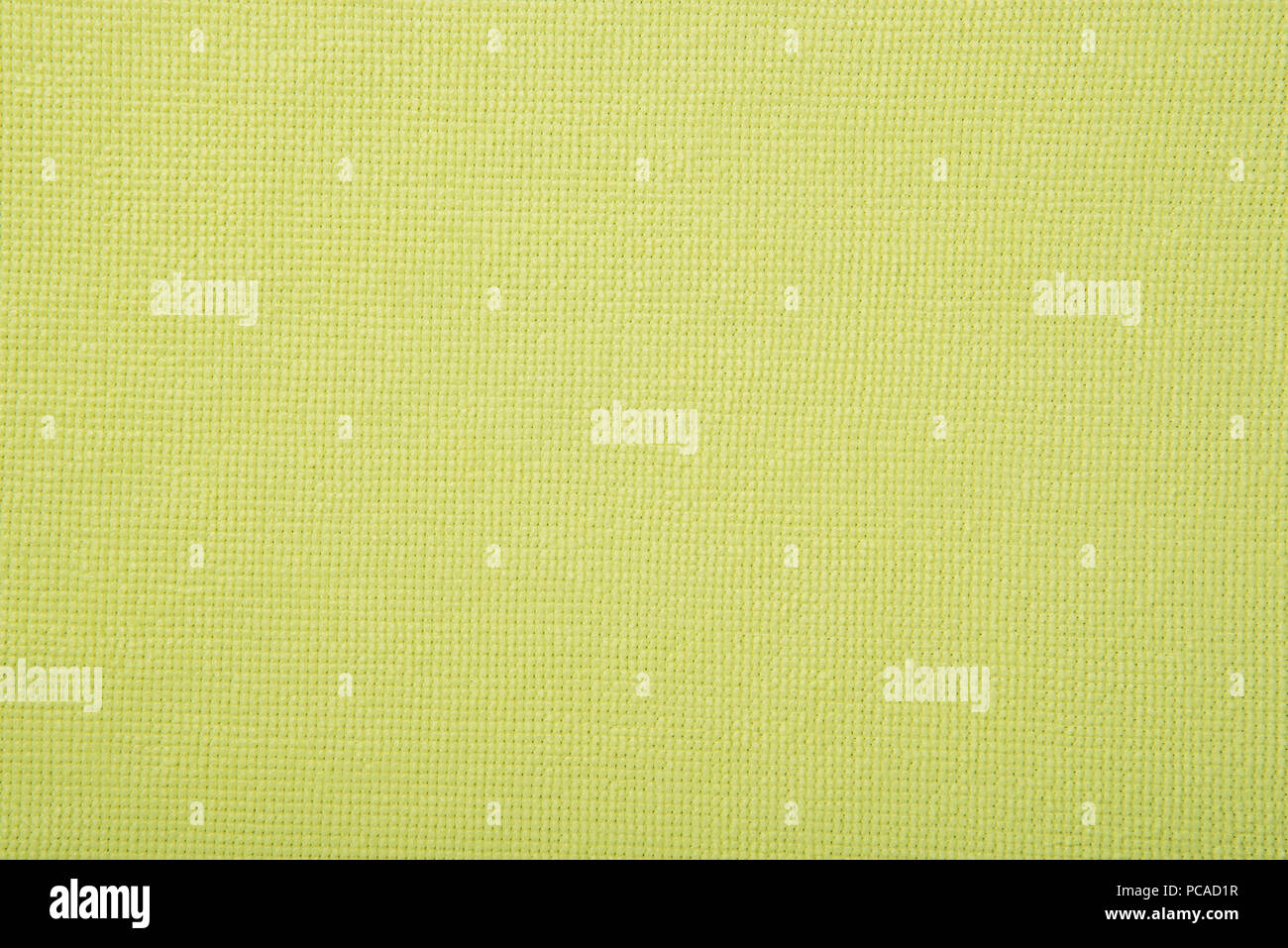 Texture of soft cotton fluffy yellow towel as a beautiful background Stock Photo