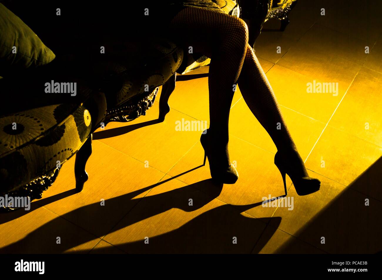 Young woman legs heels Stock Photo - Alamy
