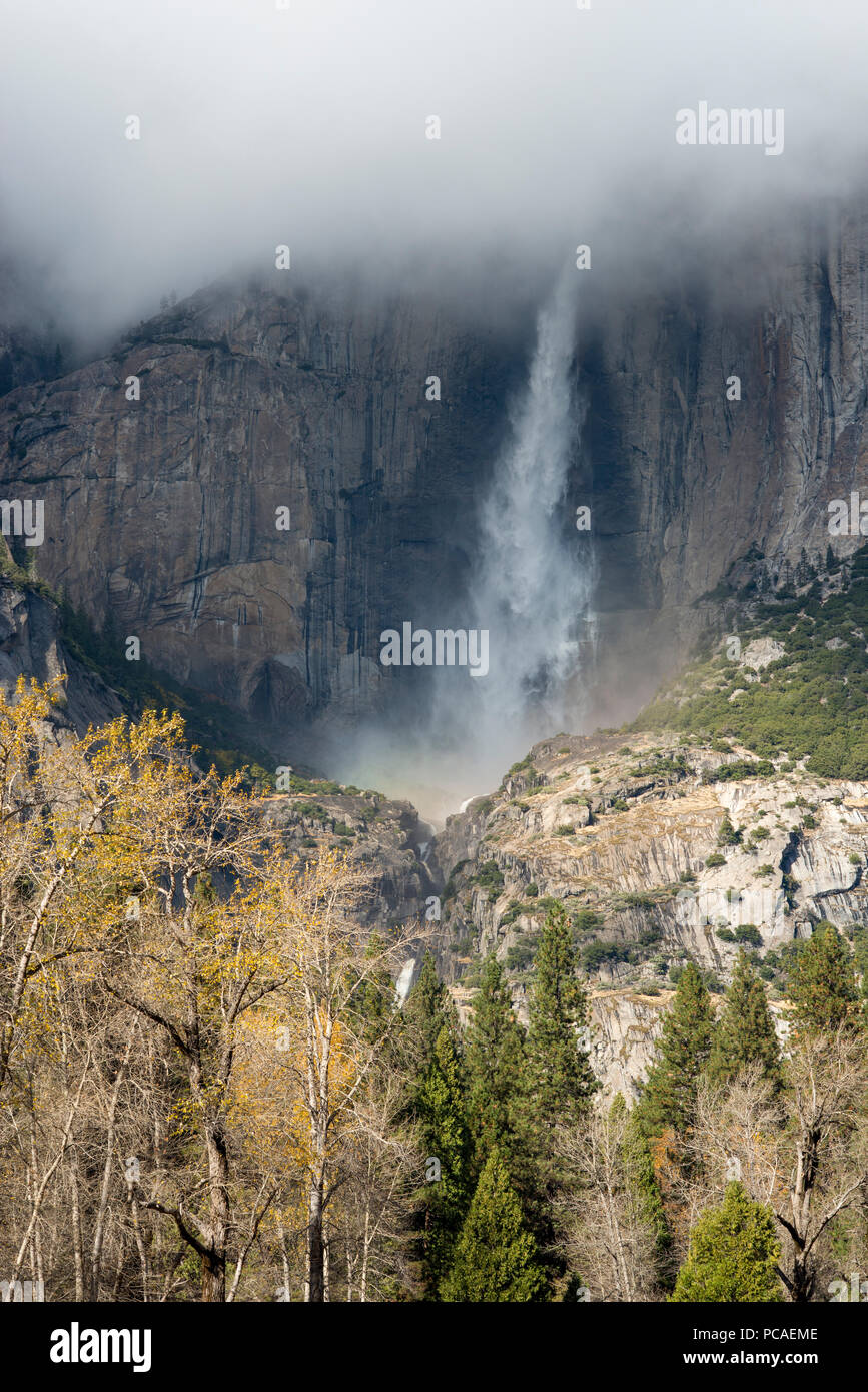 Waterfall emerging from clouds from El Capitan in Yosemite National Park, UNESCO, California, United States of America, North America Stock Photo