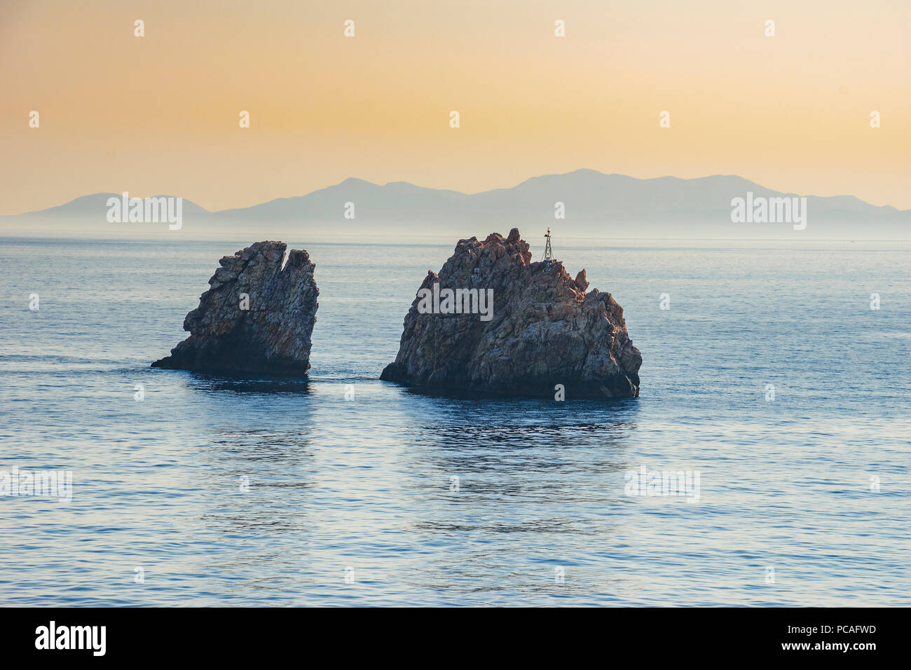 The famous ''Portes rocks'' is the place where the ferry Samina Express was hit on the way into Paros Harbour on the night of Tuesday, 26th. Stock Photo