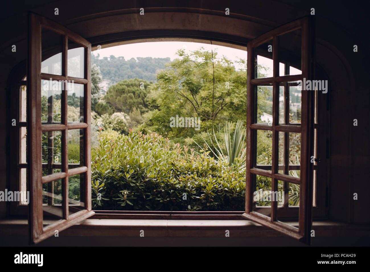 Opened old window and beautiful garden Stock Photo Alamy
