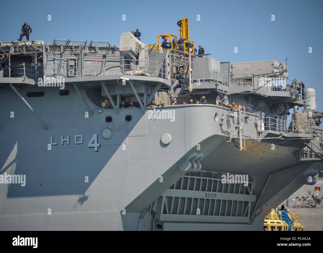 SAN DIEGO (Jul. 31, 2018) Sailors, assigned to amphibious assault ship USS Boxer (LHD 4), stand-by as the ship is being prepared to get underway. Boxer is underway conducting routine operations off the coast of Southern California. (U.S. Navy Photo by Mass Communication Specialist 2nd Class Jesse Monford/RELEASED) Stock Photo