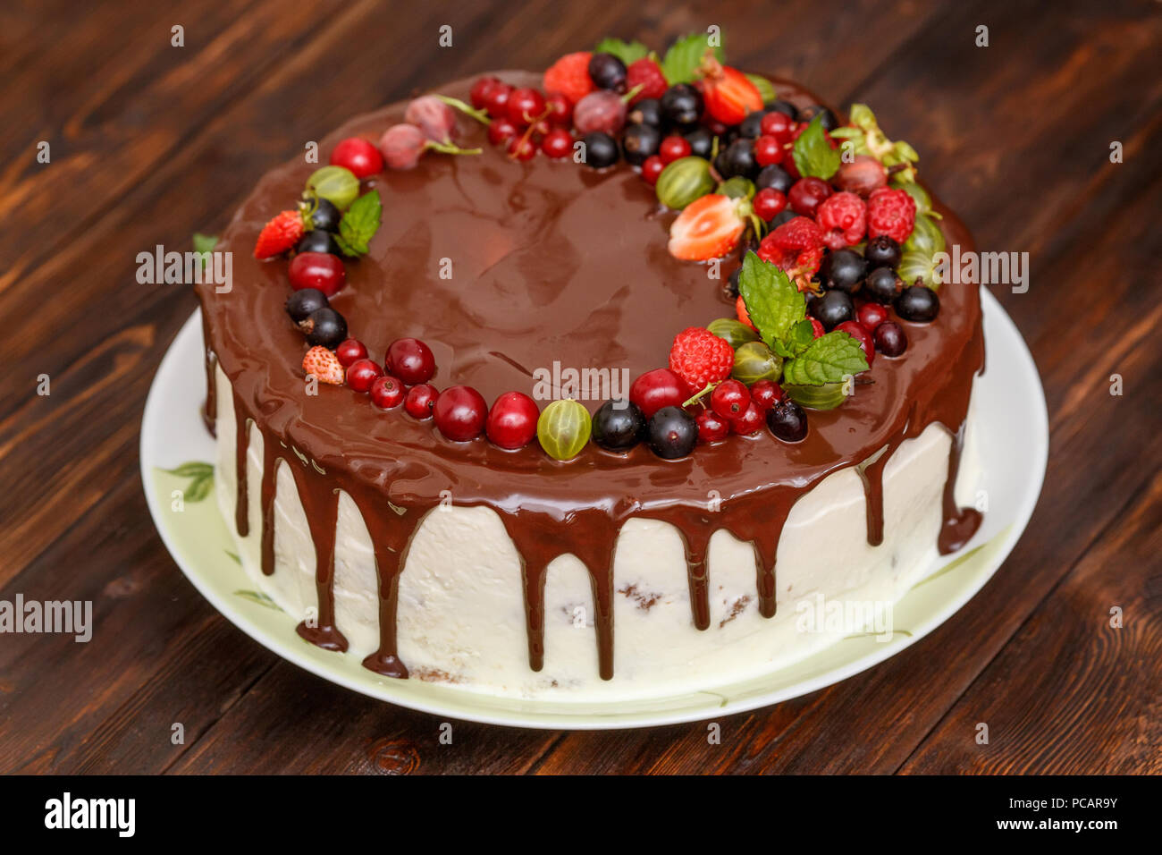 Modern Homemade Chocolate Cake With Fresh Berries Closeup Stock