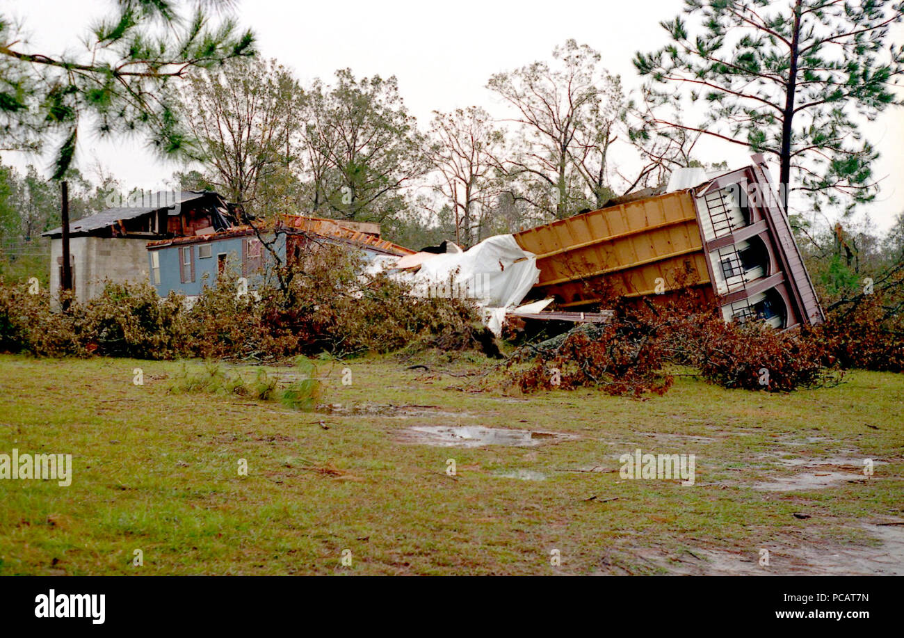 This photograph shows homes that were damaged after hurricane Hugo made landfall north of Charleston, South Carolina in 1989.   Late in the evening on September 21, 1989, the eye of Hurricane Hugo struck the coast of South Carolina north of Charleston. Winds of 135 mph, a tidal surge of 12-17 feet and heavy rains killed dozens of people and caused 7 billion dollars in damage. CDC personnel were deployed to assist communicable disease and safety-related issues.   Date:1989 Content credits:/ xxxxx Photo credit:Xxxxxxxxxx Image storage:VEC/ GHO storage Support File:CD 124 DH/ 006  URL: http Stock Photo