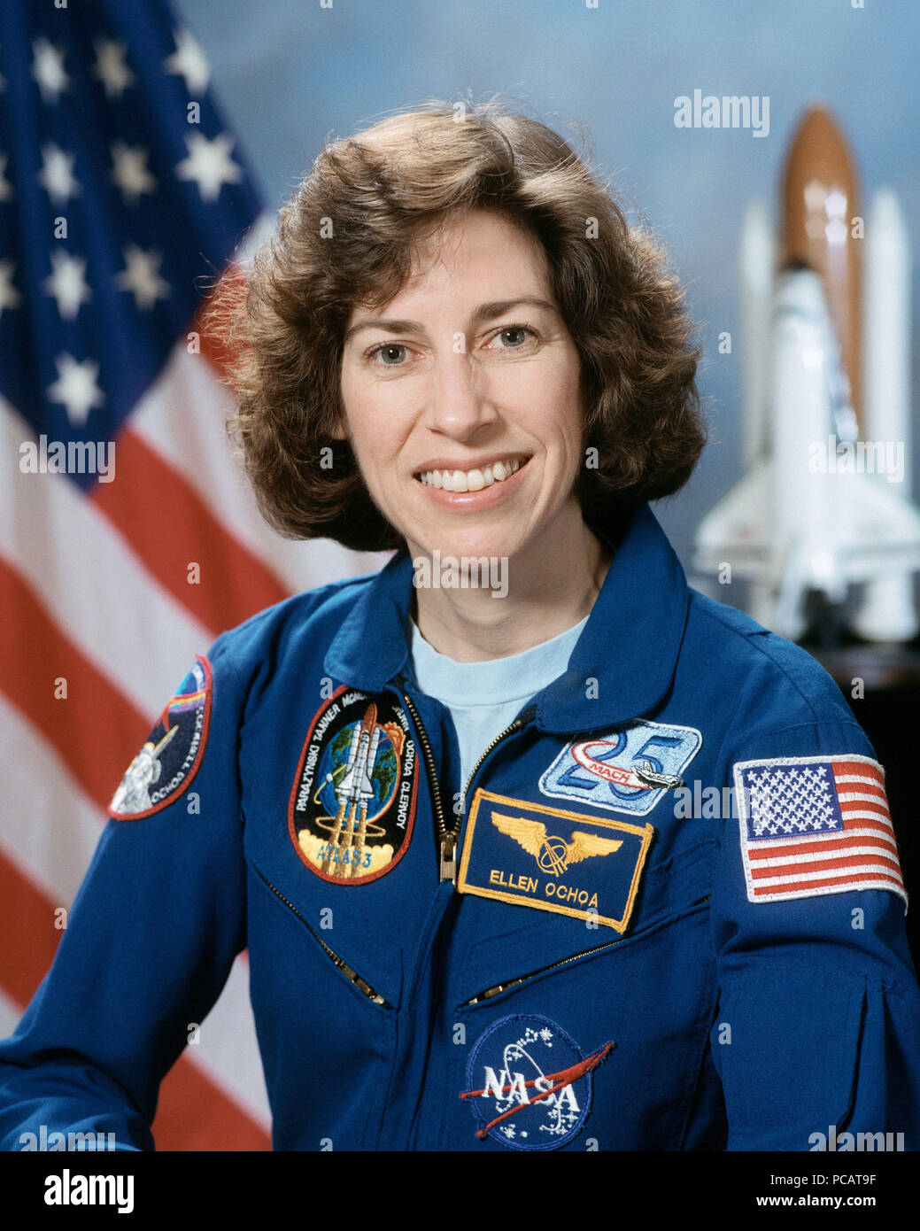Portrait of NASA Astronaut Ellen Ochoa wearing a blue flight suit. Stock Photo