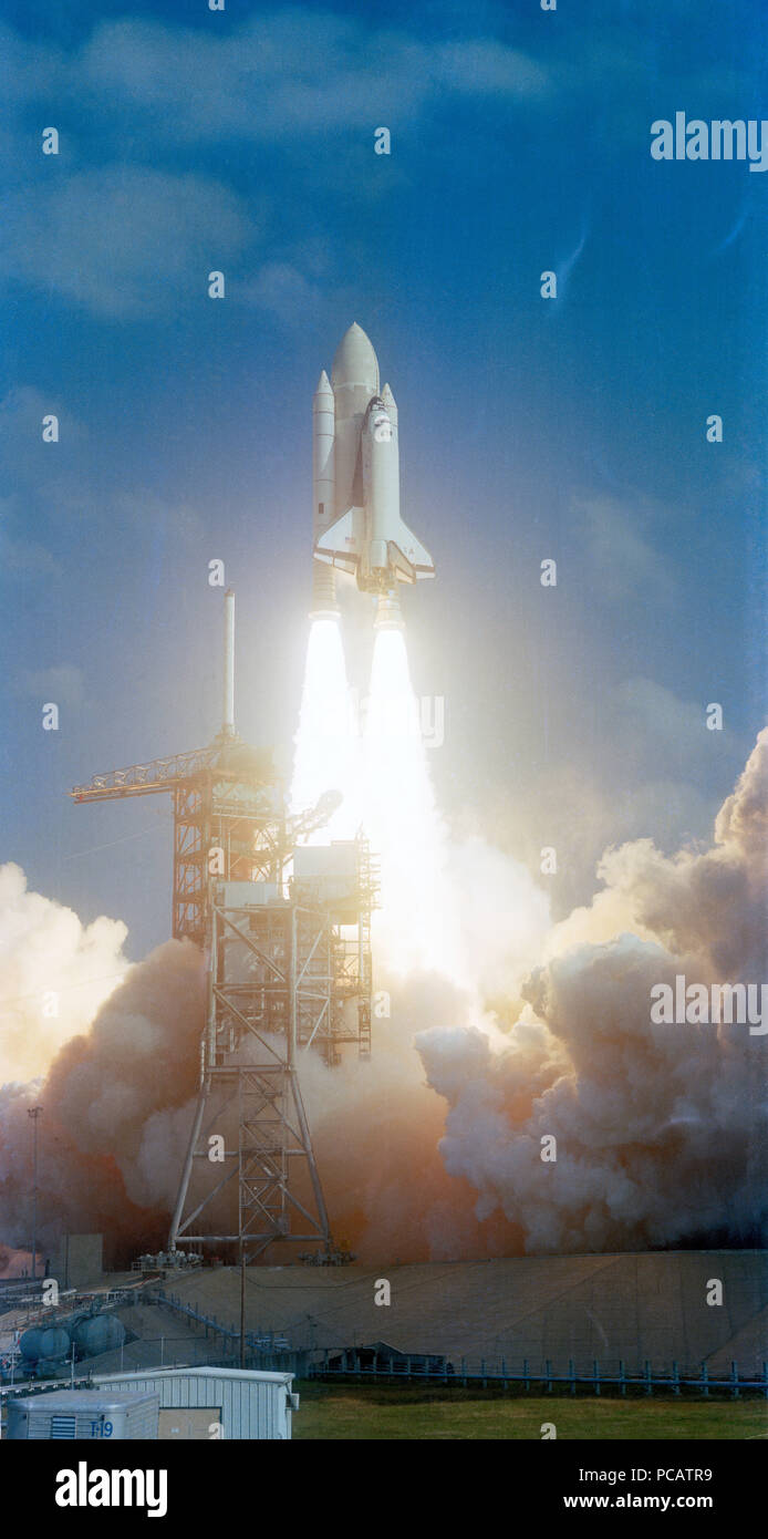 Space Shuttle Orbiter Columbia mated to its external fuel container (ET) and two solid rocket boosters (SRB) lifts off from Launch Pad 39A for the begining of STS-2. Stock Photo