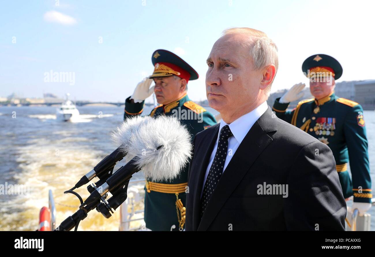 Russian President Vladimir Putin, center, during Navy Day celebrations ...