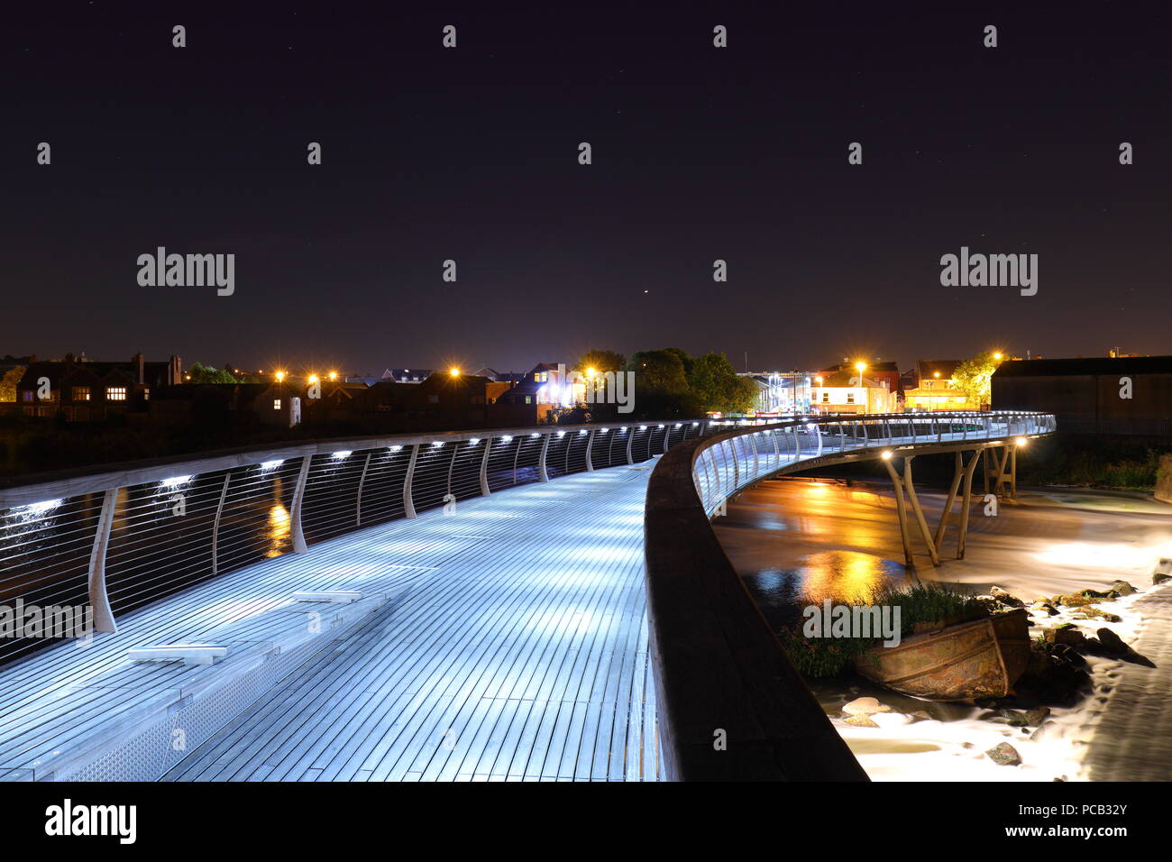 The Millennium Bridge over the River Aire in Castleford at night Stock Photo