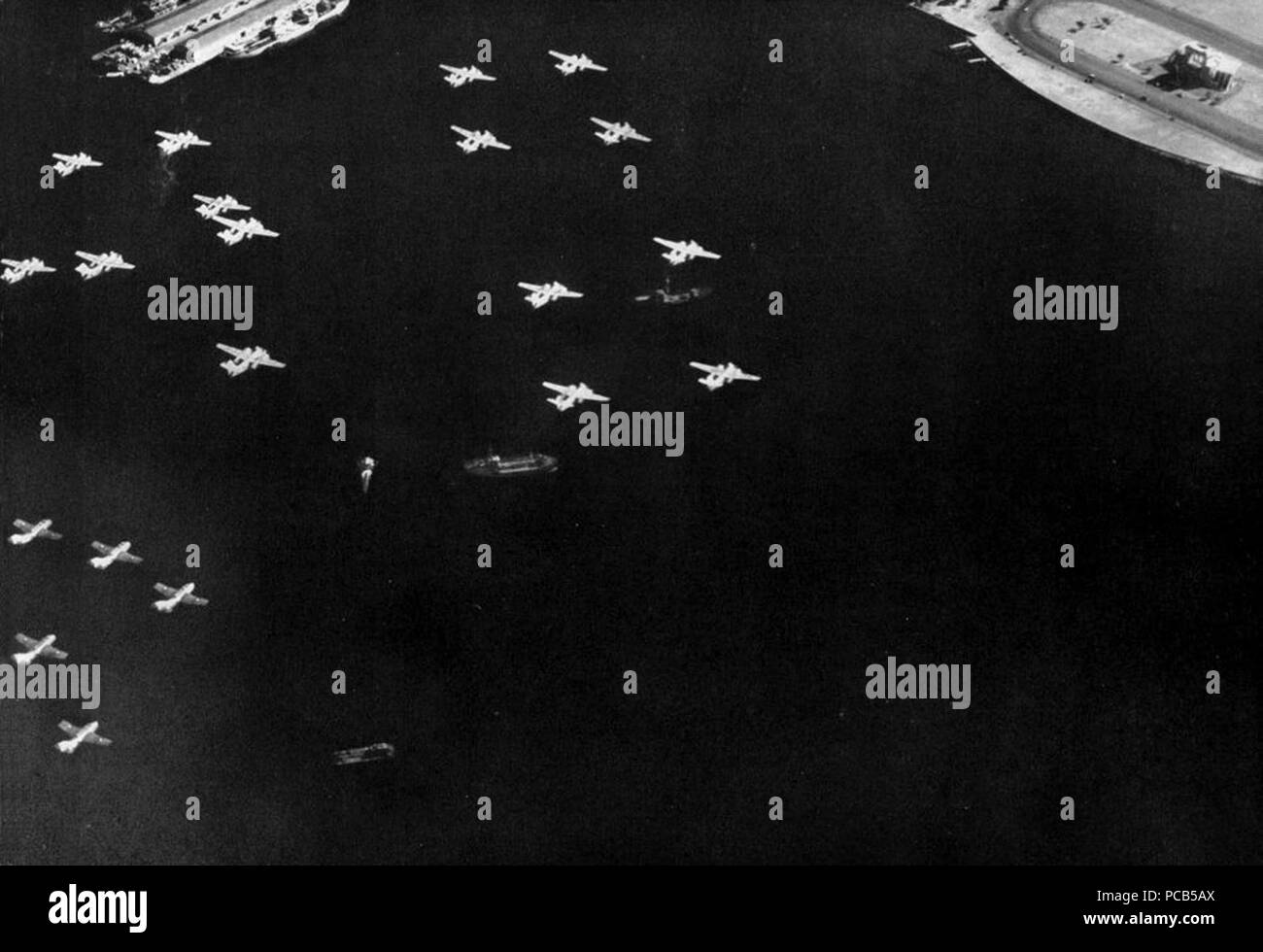 Aircraft fly over Manila at the end of exercise Oceanlink, 13 May 1958