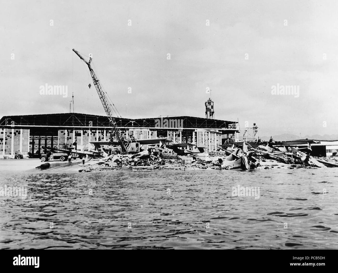 Aircraft wreckage at Hangar 6 NAS Ford Island 1941. Stock Photo