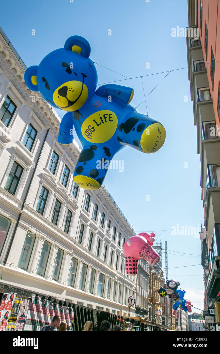 Oslo, Norway, July 21, 2018: 'Hug Life' - colorful art installation by Norwegian artists BROSLO - giant inflatable teddy bears suspended in the air. Stock Photo