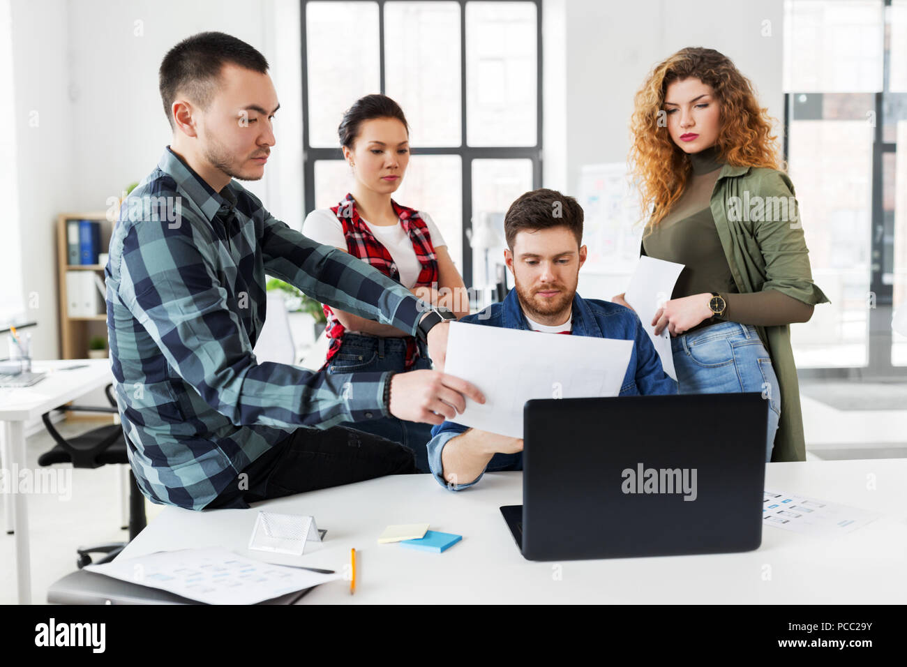 creative team working on user interface at office Stock Photo