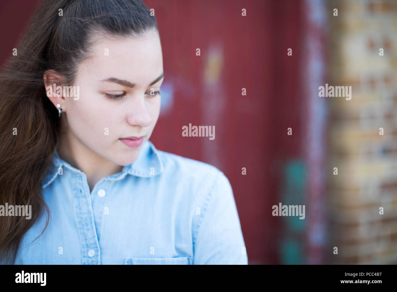 Head And Shoulders Portrait Of Serious Teenage Girl Stock Photo - Alamy