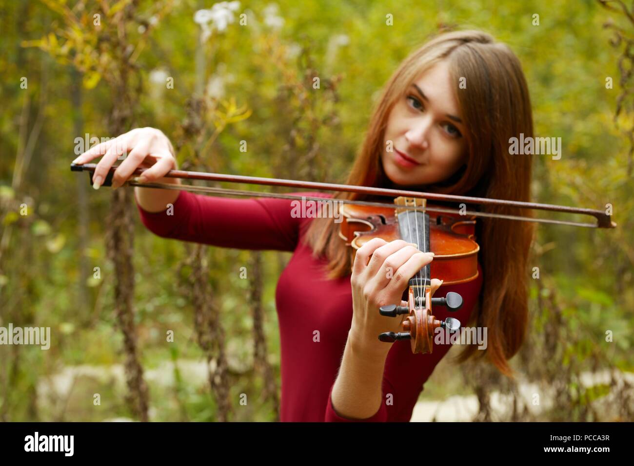 Beautiful girl with violin Stock Photo - Alamy