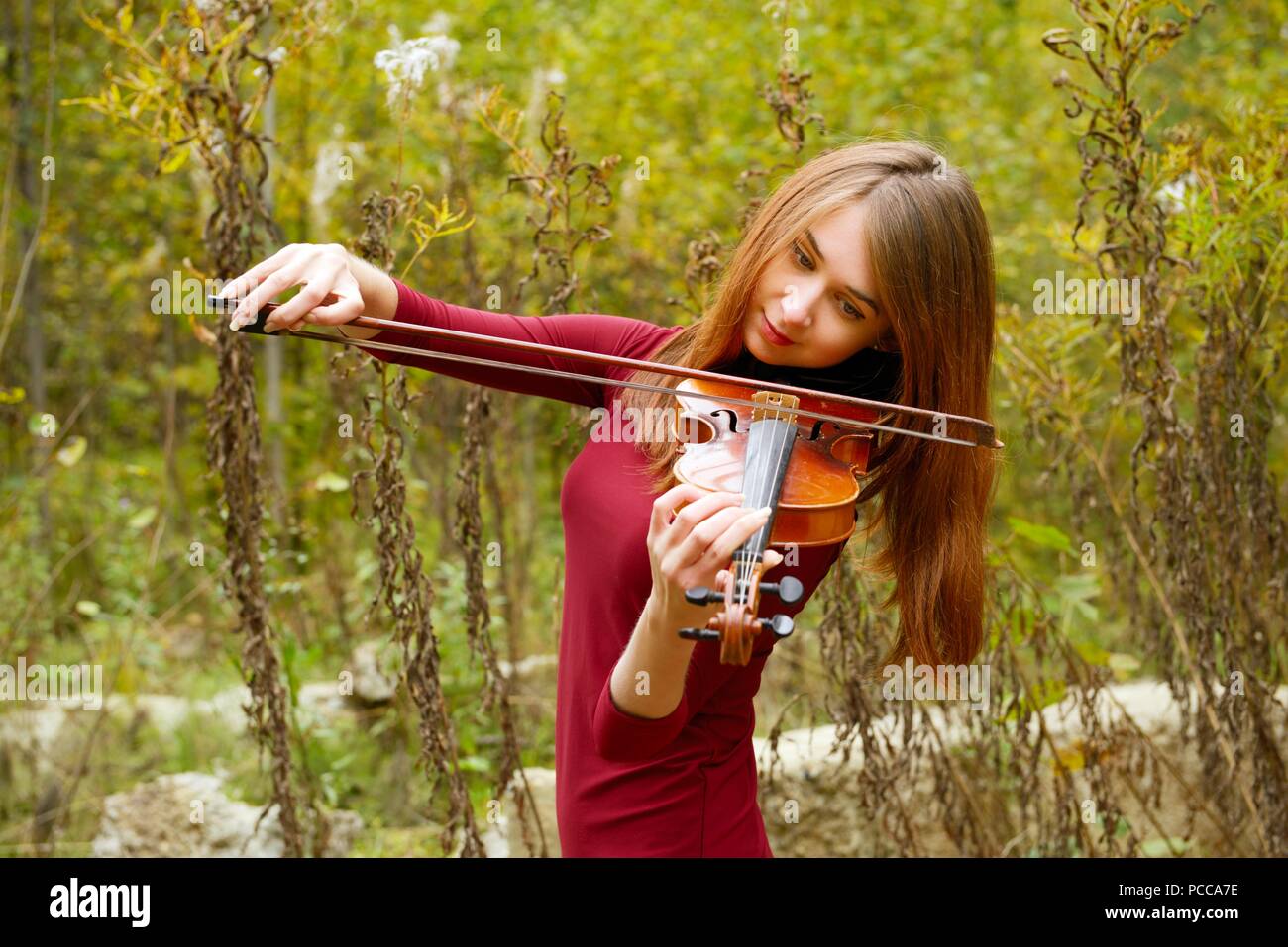 Beautiful girl with violin Stock Photo - Alamy