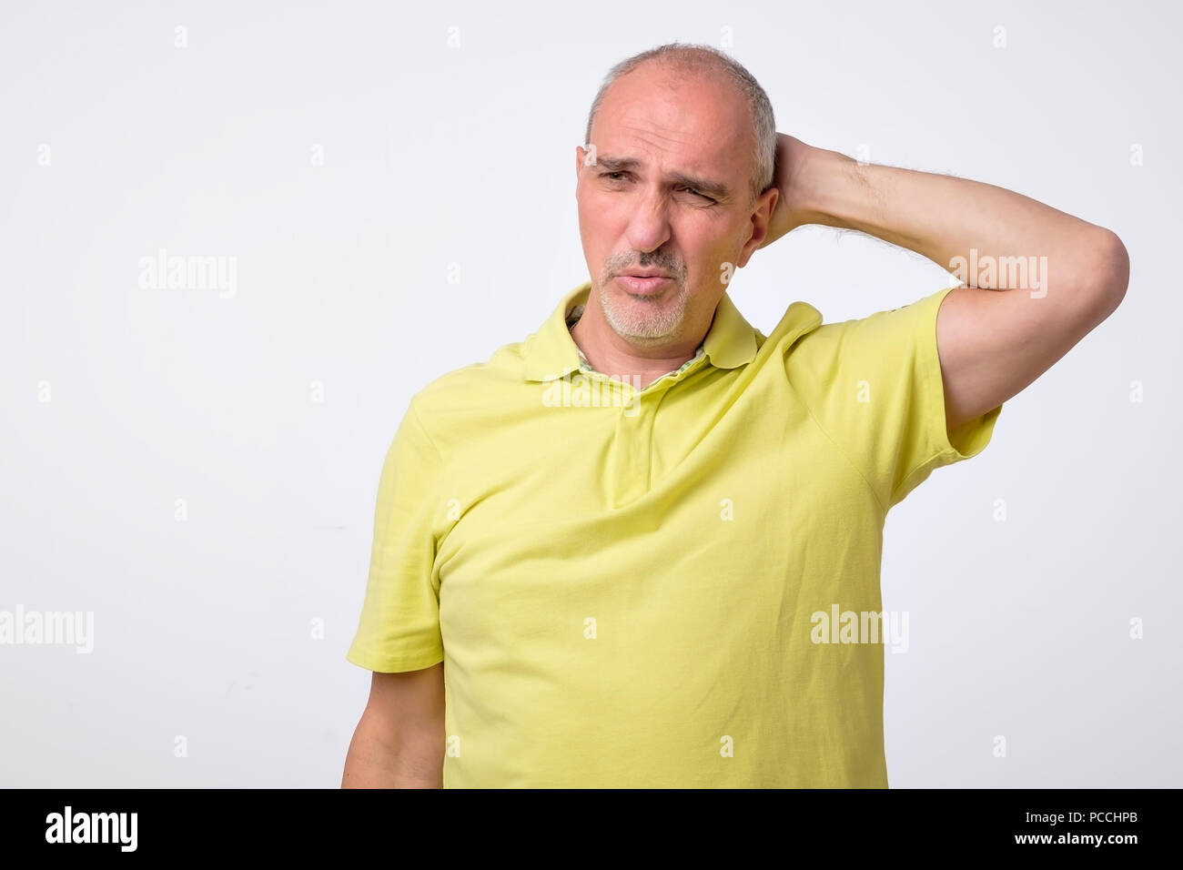 Seniors portrait of contemplative old caucasian man looking at camera. Copy space Stock Photo