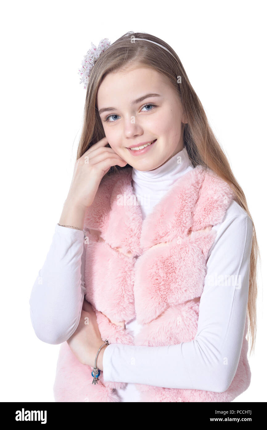 Happy little girl in pink fur vest posing Stock Photo Alamy