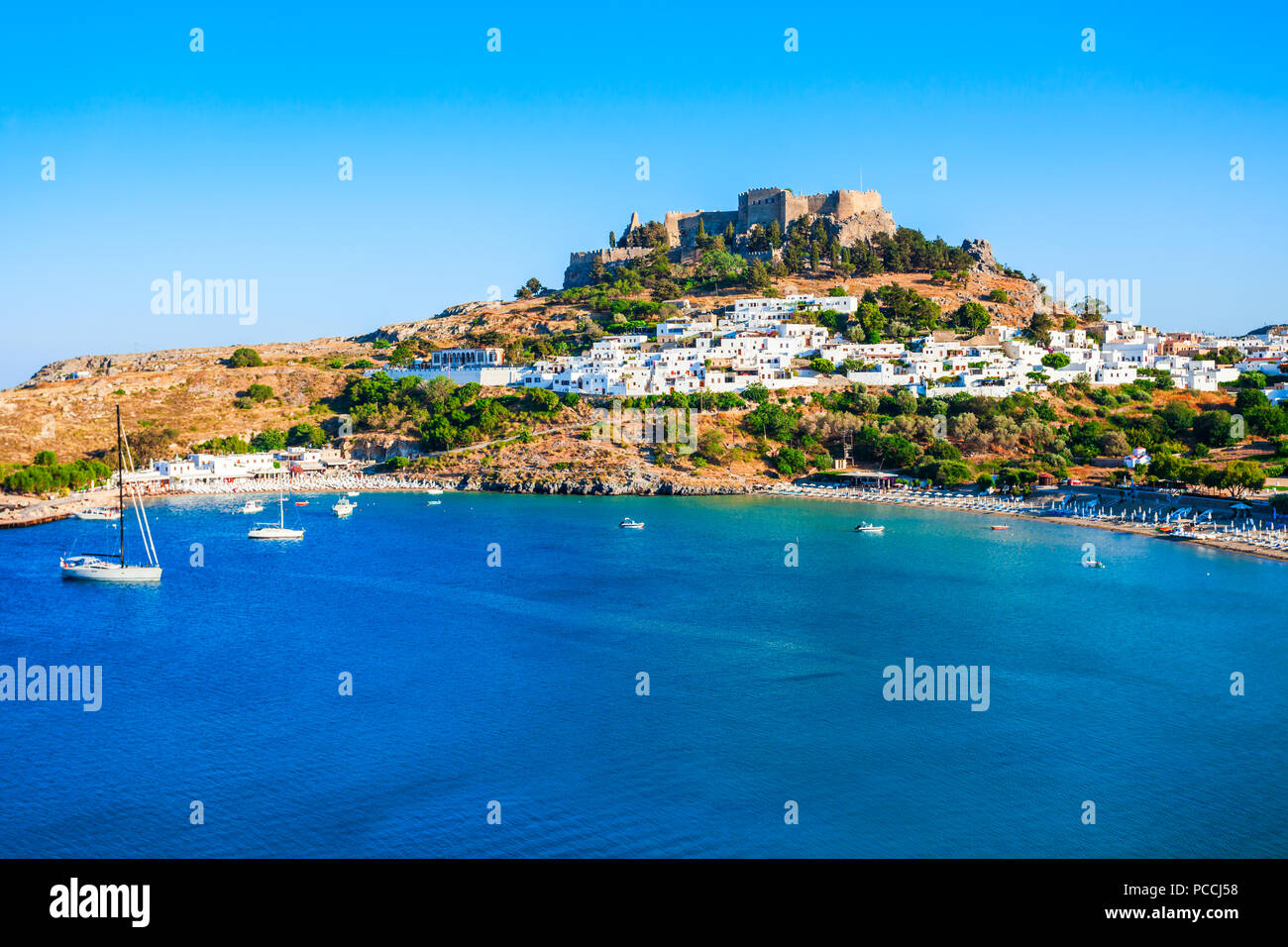 Lindos Acropolis and beach aerial panoramic view in Rhodes island in