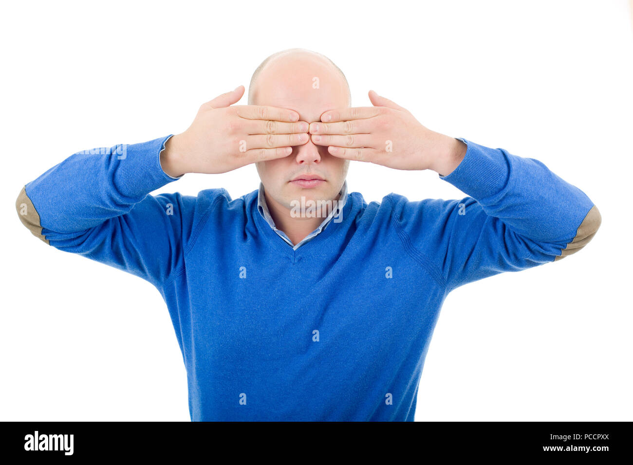 Man covering his eyes, isolated on white background Stock Photo Alamy