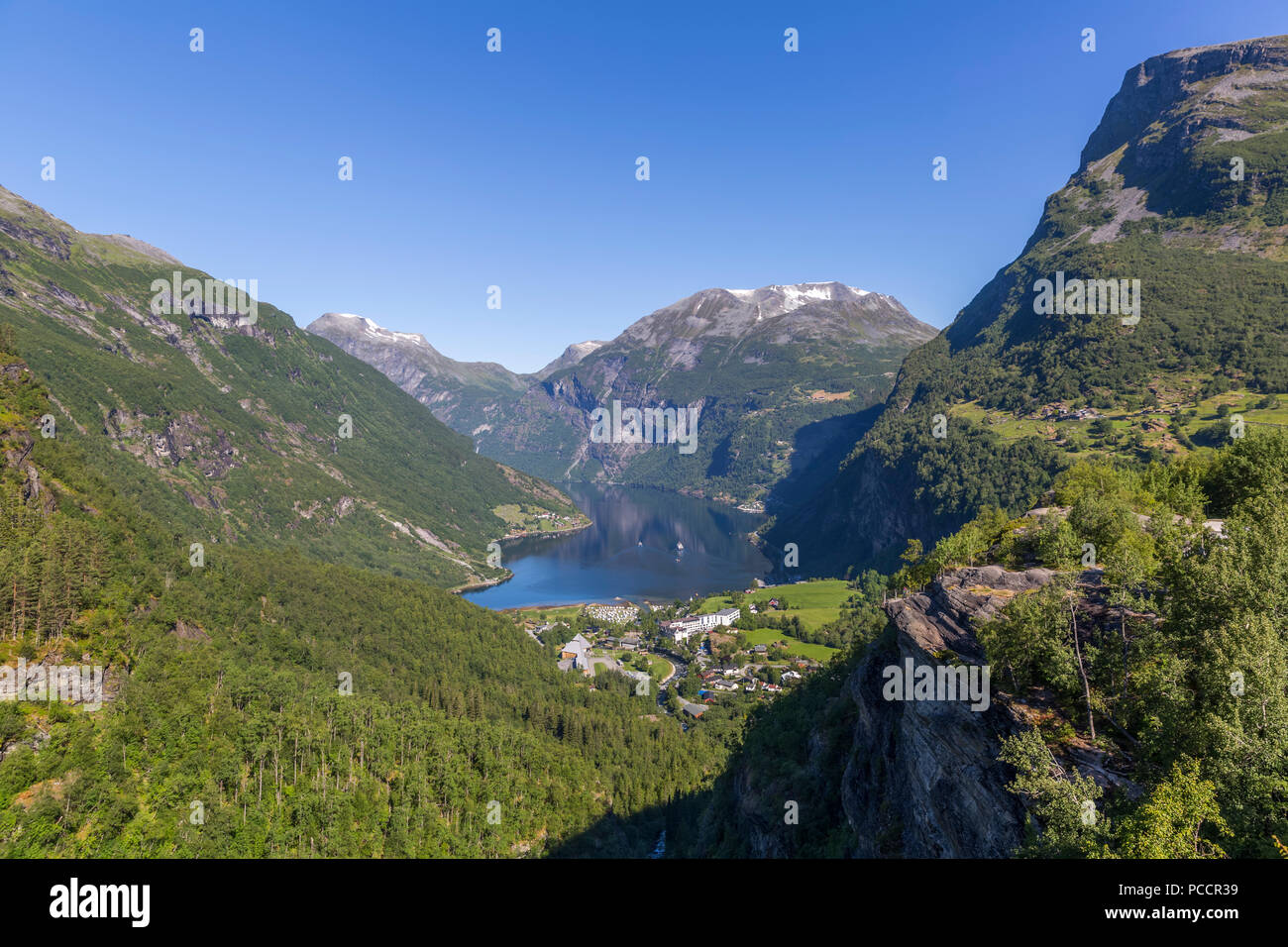 Beautiful view of Geiranger fjord and valley from Flydalsjuvet Rock Stock Photo