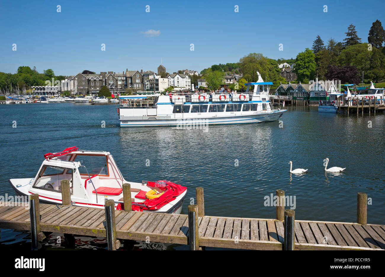 Pleasure boats boat trips on the lake in summer Bowness on Windermere Lake District National Park Cumbria England UK United Kingdom GB Great Britain Stock Photo