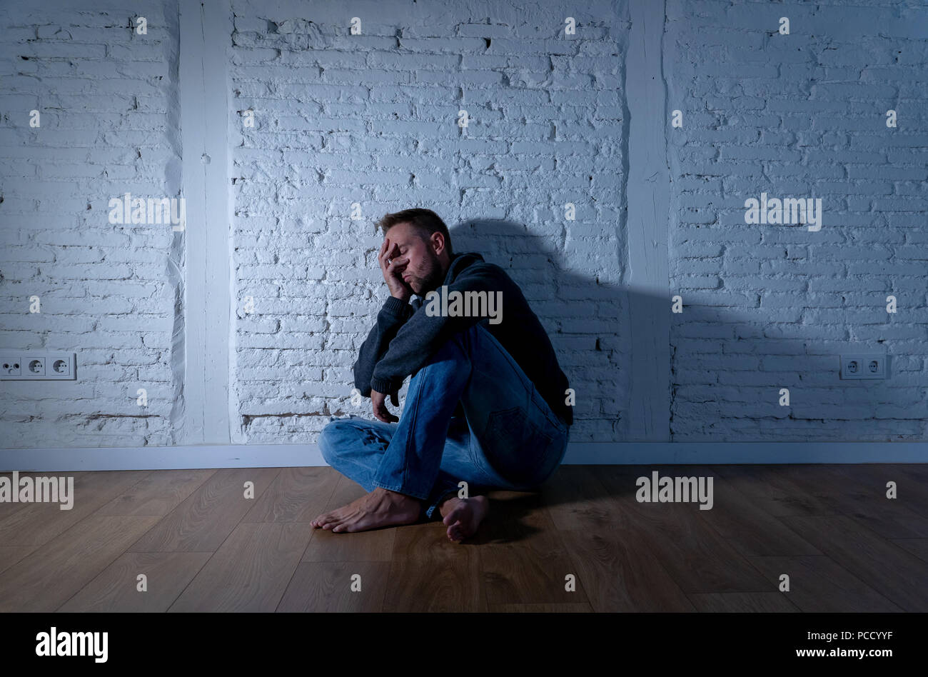 Young devastated depressed woman crying sad feeling hurt suffering ...