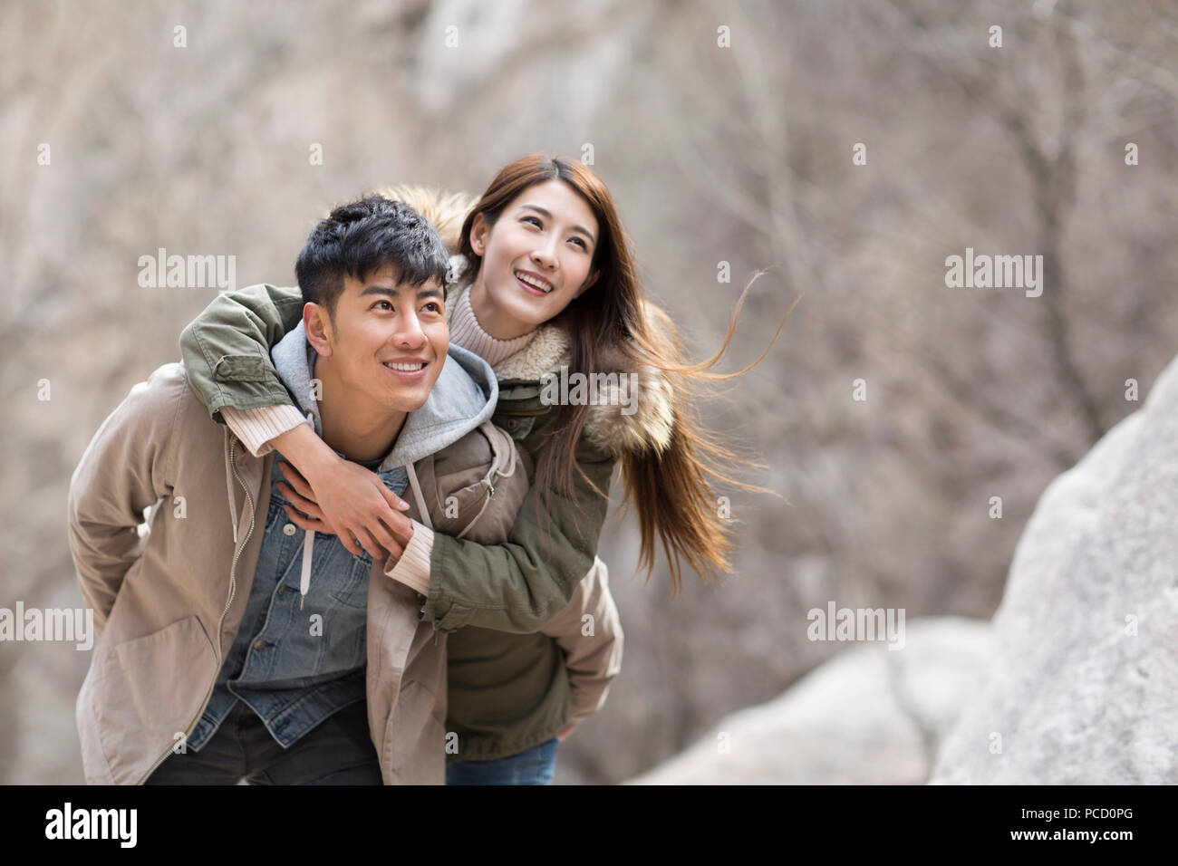 Happy young chinese couple hiking hi-res stock photography and images ...