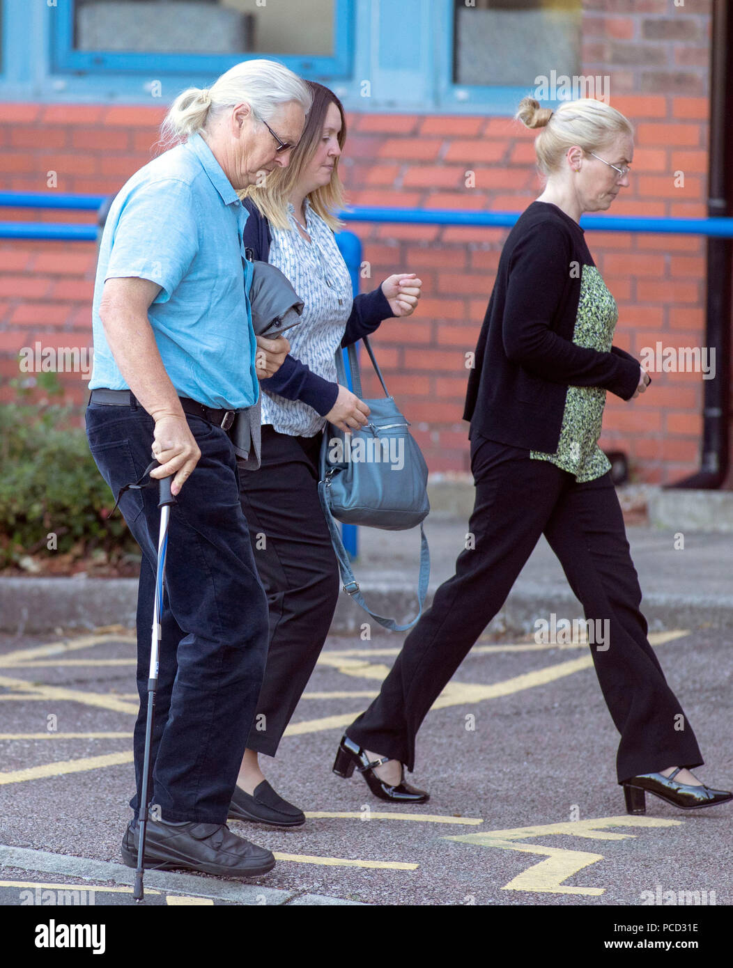 Duncan Tomlin's father, Paul Tomlin (left), arrives at the Office of the Police Crime Commissioner in Lewes, Sussex, for the misconduct hearing of Sergeant Christopher Glasspool and police constables Jamie Jackson and Daniel Jewell. Stock Photo