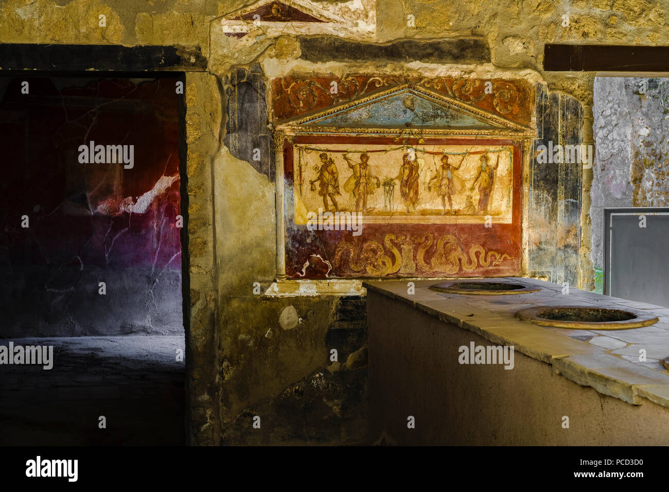 Casa e Thermopolium di Vetutitus Placidus, a private house where hot food was served, with lararium room wall painting, Pompeii, UNESCO, Italy Stock Photo