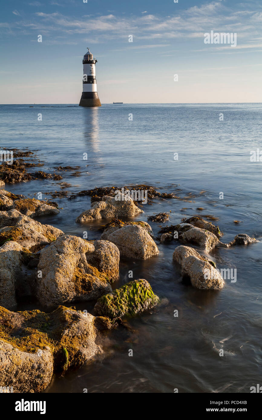 Lighthouse at Penmon Point, Anglesey, North Wales on a calm day Stock Photo