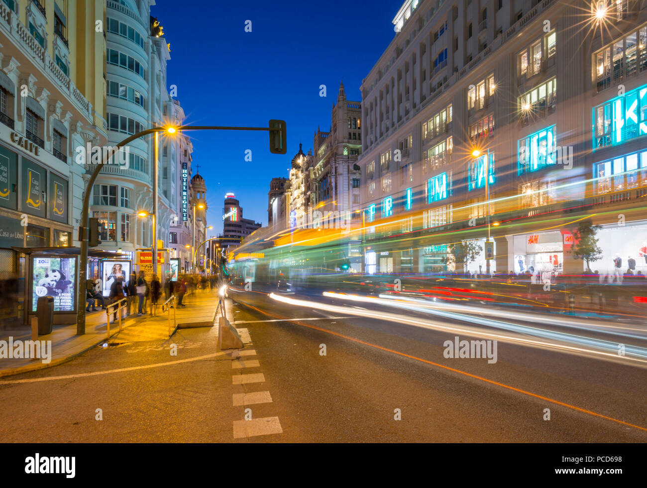 View of architecture and trail lights on Gran Via at dusk, Madrid, Spain, Europe Stock Photo