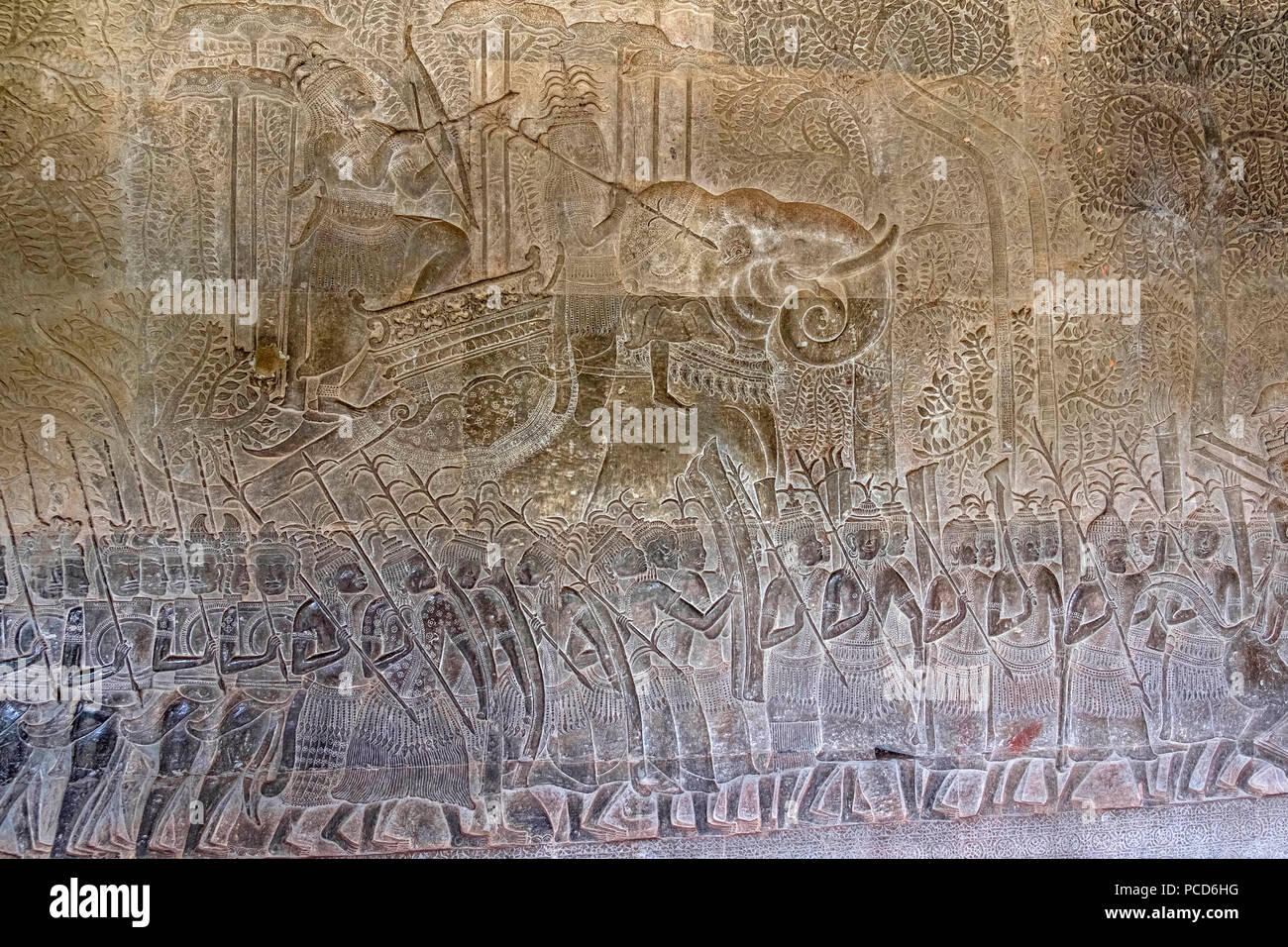 Bas relief of the commander of the vanguard riding an elephant and the army of King Suryavarman II at Angkor Wat, UNESCO, Siem Reap, Cambodia Stock Photo