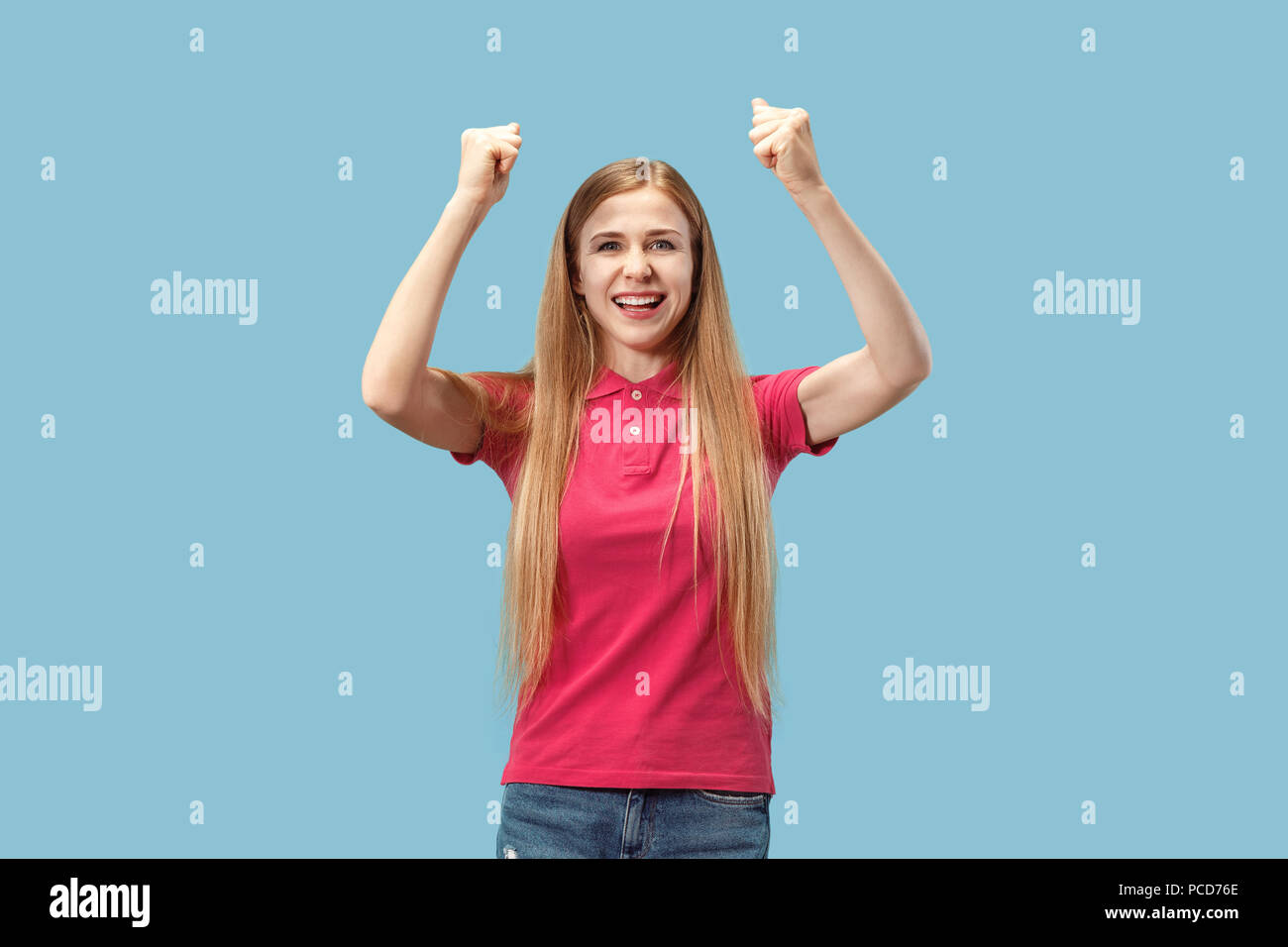 Winning success woman happy ecstatic celebrating being a winner. Dynamic energetic image of female model Stock Photo