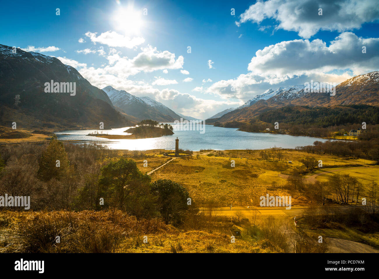 Sunshine and The Glenfinnan Monument beside Loch Shiel, Highlands, Scotland, United Kingdom, Europe Stock Photo