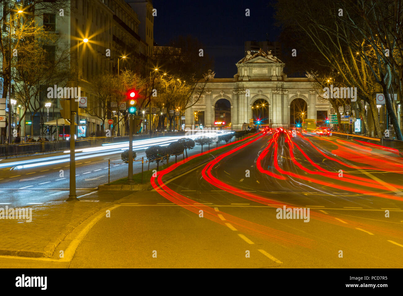 View of Triomphal Arch (Puerta de Alcala) in Plaza de la Independencia at dusk, Madrid, Spain, Europe Stock Photo