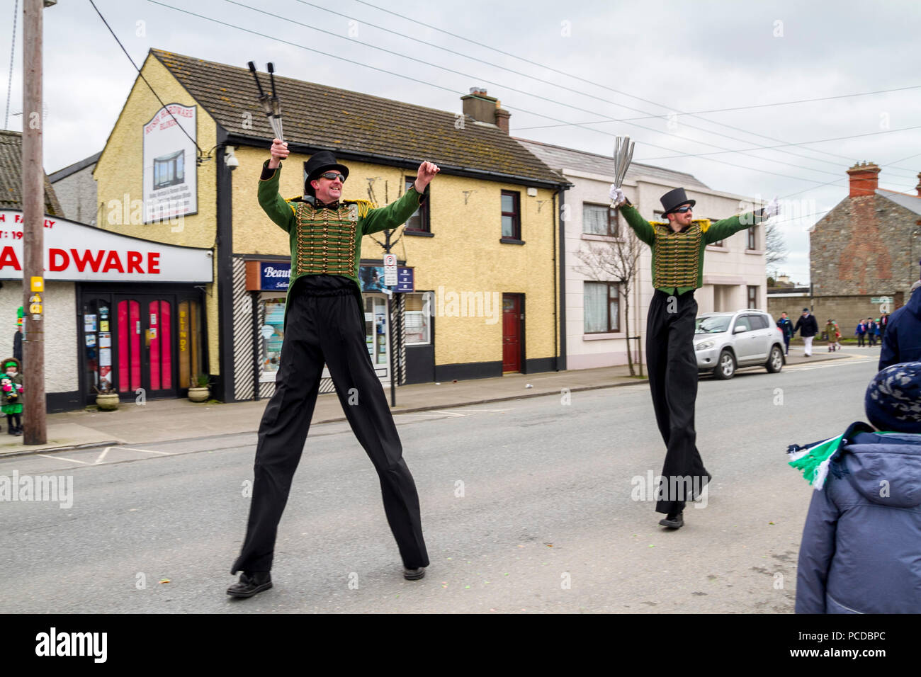 Tall men on stilts, stilt walkers parade costume Dublin Ireland Stock Photo